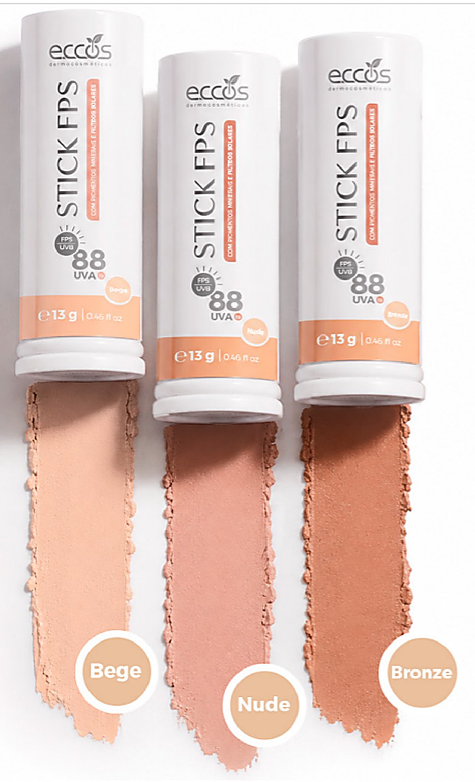 Os tr�s sticks Chroma FPS 88 lado a lado, cada um sobre a sua pincelada de cor: Bege, Nude e Bronze